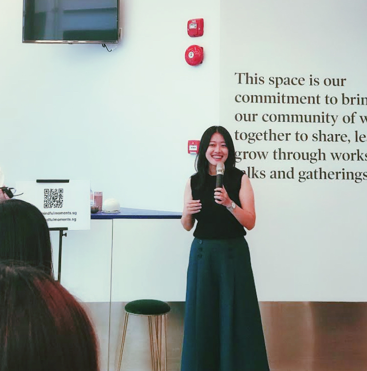Erin speaking at a community event