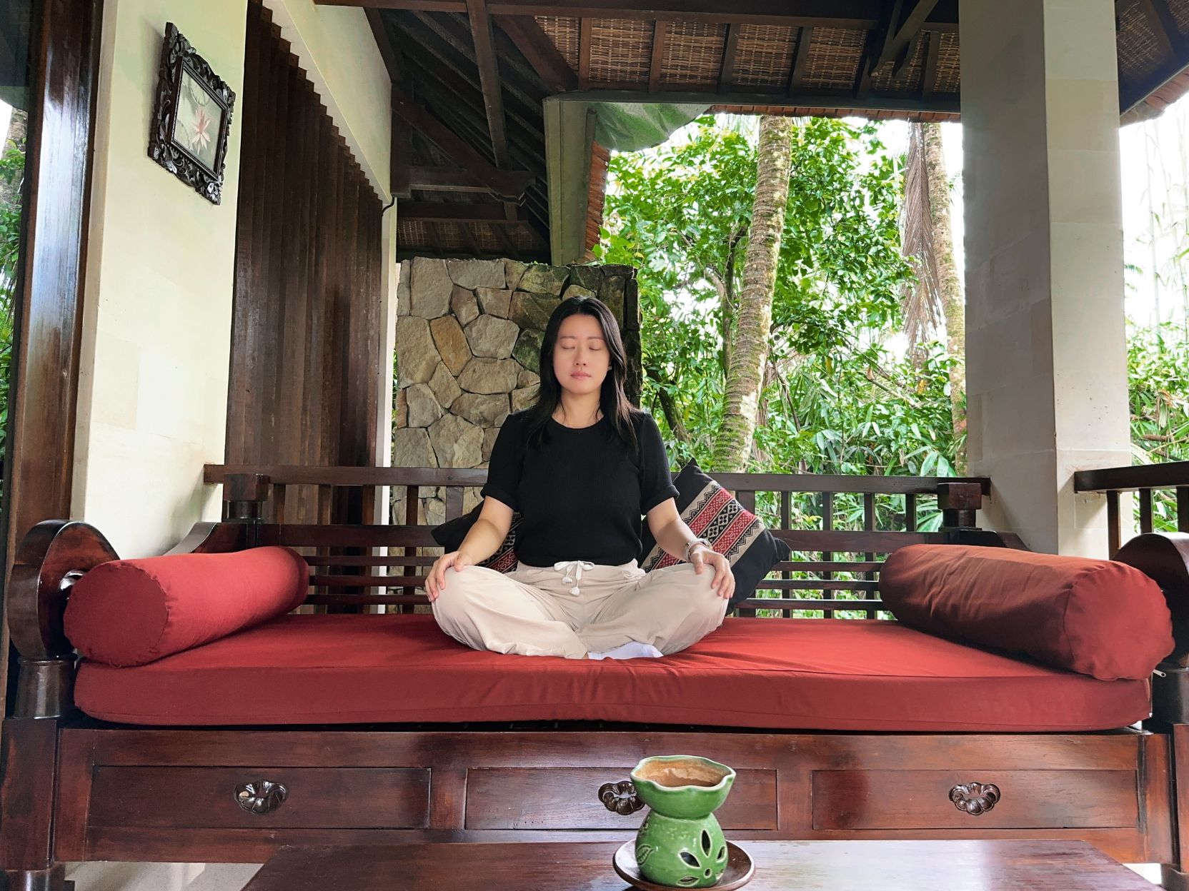 Erin in stillness on a Balinese patio