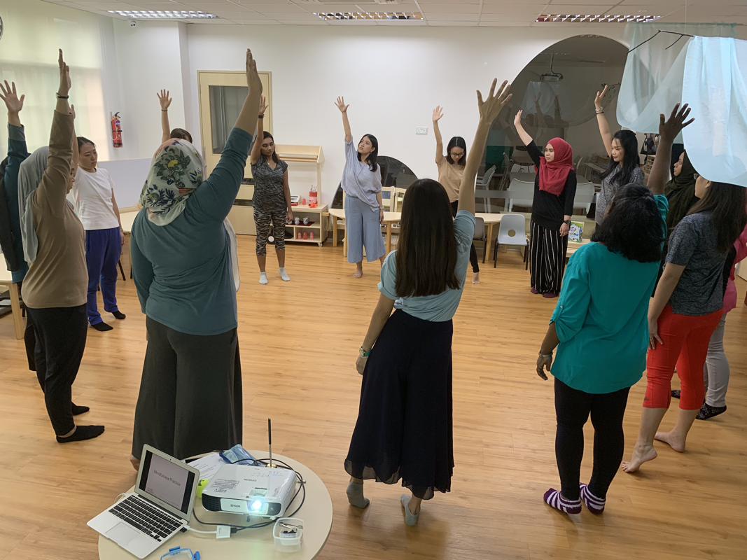 Erin leading a mindful movement session at Ebridge School